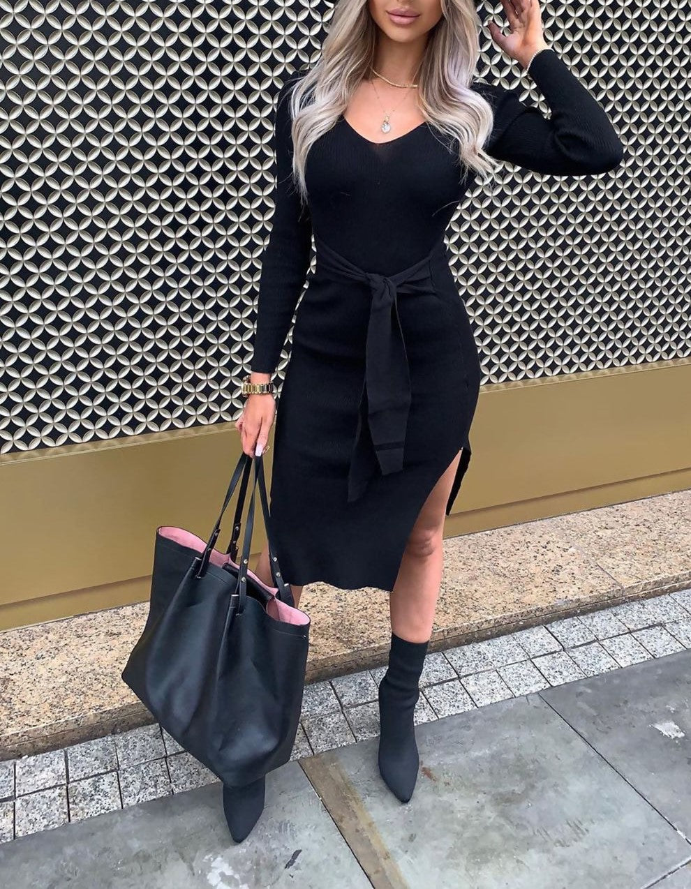 Figure hugging black belted bodycon knitted dress